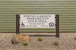 Gold Hill apartment for rent - a sign for the spring garden apartments gold hill