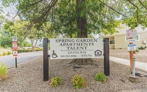 Talent apartment for rent - a sign for spring garden apartmentstalent