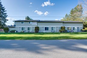 Spirit Lake townhouse for rent - A building with a sign that says "GARDENER'S" on it.