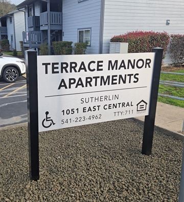 Sutherlin apartment for rent - A sign for Terrace Manor Apartments in Sutherlin, OR.