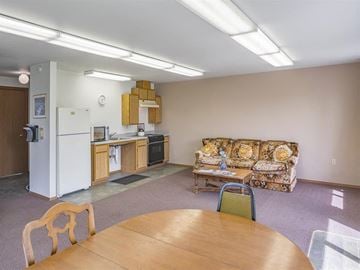 Chewelah apartment for rent - a living room with a kitchen and a table