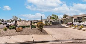 White City apartment for rent - A sign in front of a parking lot reads "Rogue Valley White City.".