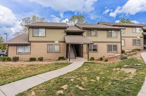 Redmond apartment for rent - A two-story residential building with a front yard.