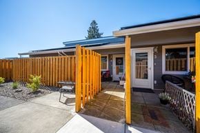 Harrisburg apartment for rent - A house with a wooden fence and a white door.