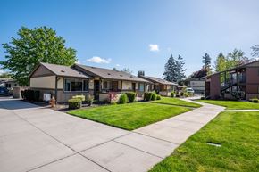 Canby apartment for rent - a row of houses in a neighborhood with a sidewalk