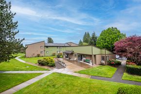 Sherwood apartment for rent - the view of a house with a yard and a patio