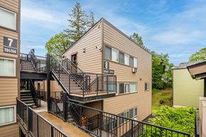 St.Helens apartment for rent - the view of a condo building with stairs and balconies