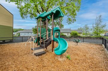 St. Helens apartment for rent - the playground at the preserve at polk apartments with a slide