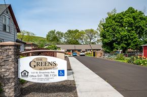 Milton-Freewater apartment for rent - the greens at montgomery sign in front of a house