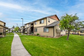 Madras apartment for rent - a sidewalk in front of a row of houses