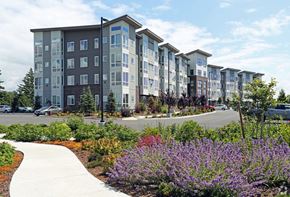 Bellingham apartment for rent - an exterior view of an apartment building on a city street
