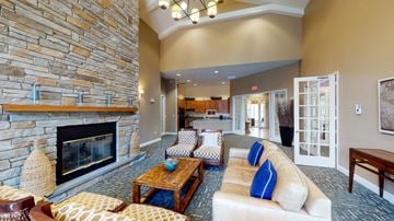 Billerica apartment for rent - a living room with a fireplace and couches
