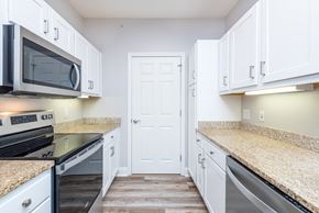 Chelmsford apartment for rent - Drum Hill 2 Bedroom Apartment Kitchen with stainless steel range and microwave, granite counters, stainless dishwasher