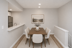 Indianapolis apartment for rent - A dining room with a wooden table and chairs.