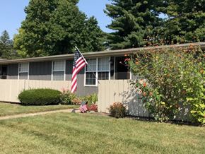Lancaster apartment for rent - a house with an flag in front of it