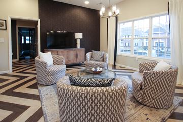 Columbus apartment for rent - a living room with couches and chairs and a television