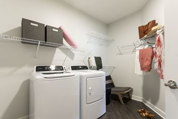 Laundry room with shelves