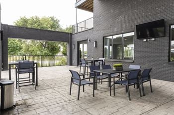 Outdoor grill with intimate seating area
