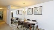 Baltimore apartment for rent - Dining room with a dining table and chairs and a wall with artwork at Village of Pine Run Apartments & Townhomes*, Maryland, 21244
