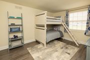 Nottingham apartment for rent - A bedroom with a bunk bed and a ladder.at Chapel Valley Townhomes, Nottingham