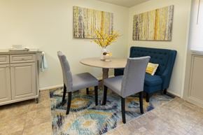 Baltimore apartment for rent - A dining room with a round table and grey chairs  at Winston Apartments, Baltimore, Maryland