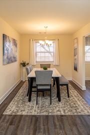 Baltimore apartment for rent - A dining room with a table and chairs at Liberty Gardens Apartments, Baltimore, MD