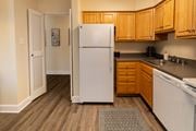 Owings Mills apartment for rent - A kitchen with white appliances at Painters Mill Apartments, Owings Mills, MD, 21117