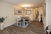 Towson apartment for rent - A dining room with a table and chairs.