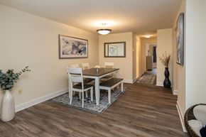 Towson apartment for rent - A dining room with a table and chairs.