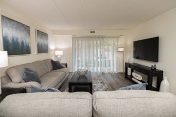Towson apartment for rent - Living room with a couch and a tv at Ivy Hall Apartments*, Towson, MD 21204