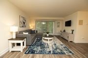 Baltimore apartment for rent - Living room with a couch and a coffee table at Village of Pine Run Apartments & Townhomes*, Baltimore, MD