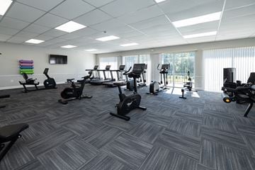 Randallstown apartment for rent - A gym with a variety of exercise equipment.