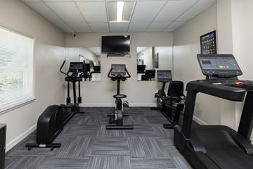 Pikesville apartment for rent - A gym with treadmills and elliptical machines.