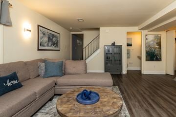 Baltimore apartment for rent - A living room with a couch and a coffee table.