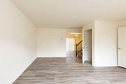 Baltimore apartment for rent - a bedroom with hardwood floors and white walls at Carlson Woods Townhomes, Baltimore