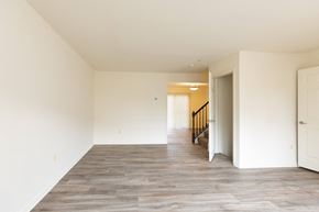 Baltimore apartment for rent - a bedroom with hardwood floors and white walls at Carlson Woods Townhomes, Baltimore