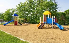 Baltimore apartment for rent - Playground with two slides and a swing set at Fairbrook Park, Baltimore