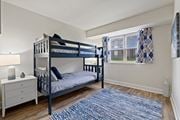 Abingdon apartment for rent - A bedroom with a bunk bed and a dresser at Woodsdale Apartments in Abingdon, MD