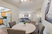 Abingdon apartment for rent - A modern dining room with a round table and chairs at Woodsdale Apartments in Abingdon, MD