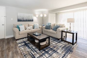 Baltimore apartment for rent - a living room with two couches and a coffee table