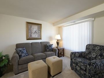 Hanover apartment for rent - a living room with couches and chairs and a window