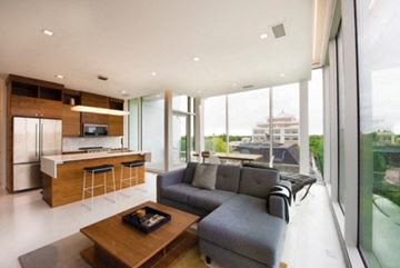 Grand Forks condo for rent - a living room with a couch and a kitchen