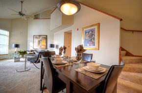 New Berlin apartment for rent - a dining room and living room with a table and chairs