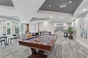 San Jose apartment for rent - A game room amenity with billiards at Elan at River Oaks in San Jose.
