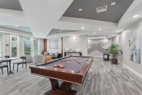 San Jose apartment for rent - A game room amenity with billiards at Elan at River Oaks in San Jose.