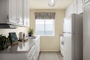 Fountain Valley apartment for rent - Kitchen with a large window at Crystal Springs apartments in Fountain Valley.