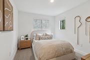 San Jose apartment for rent - A model unit bedroom with a queen size bed and natural lighting at Elan at River Oaks in San Jose.