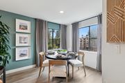 San Jose apartment for rent - A model unit dining room with large windows at Elan at River Oaks in San Jose.
