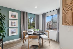 San Jose apartment for rent - A model unit dining room with large windows at Elan at River Oaks in San Jose.