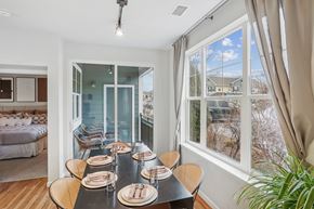 Highlands Ranch apartment for rent - A dining room with a table set for six with a view of the backyard.